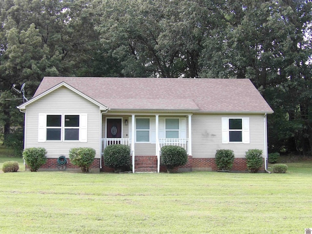 single story home featuring a front yard and a porch