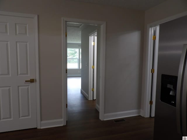 hall featuring dark hardwood / wood-style flooring