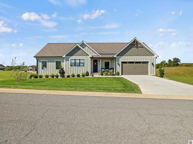 view of front facade featuring a garage and a front yard