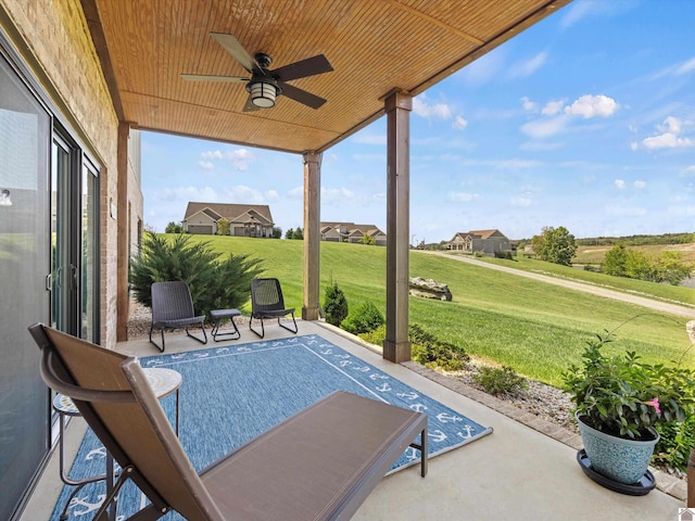 view of patio with ceiling fan