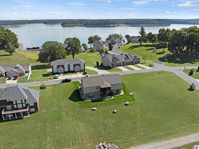 drone / aerial view with a water view