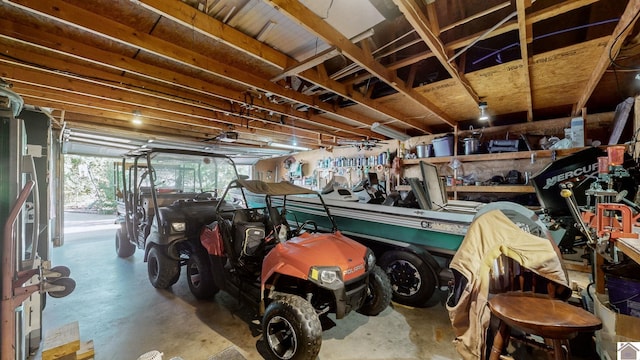 garage featuring a workshop area