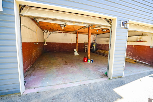 garage featuring electric water heater