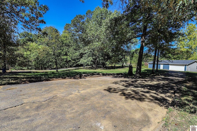 view of yard with a garage