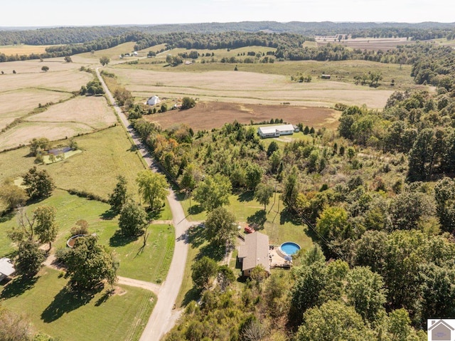 birds eye view of property featuring a rural view