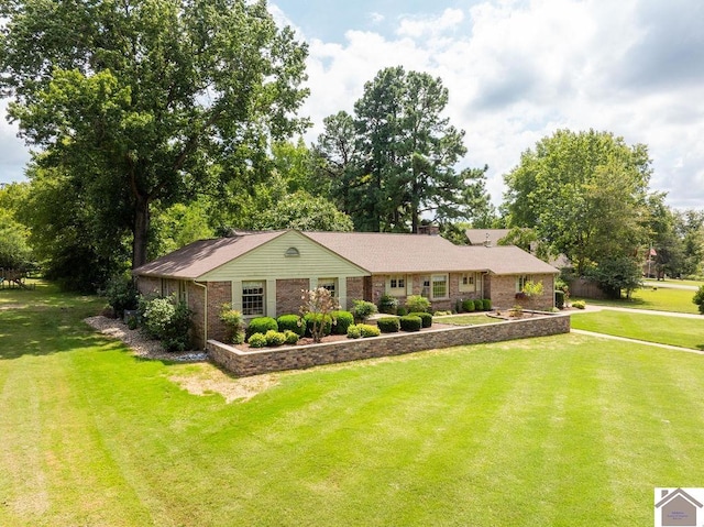 ranch-style house with a front yard