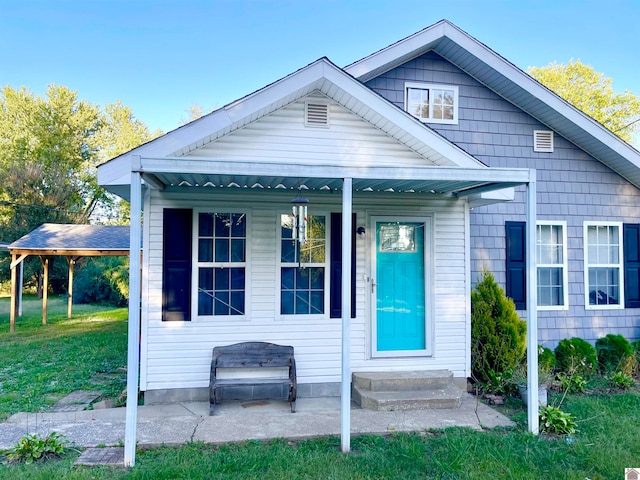 bungalow with a front lawn