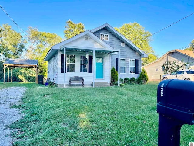 bungalow-style home with a front yard and a gazebo