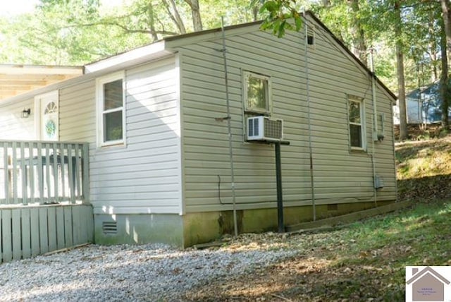 view of side of property featuring cooling unit