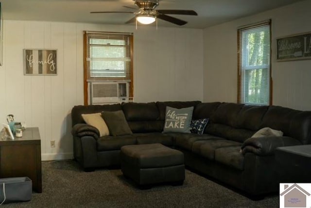 carpeted living room featuring ceiling fan and plenty of natural light