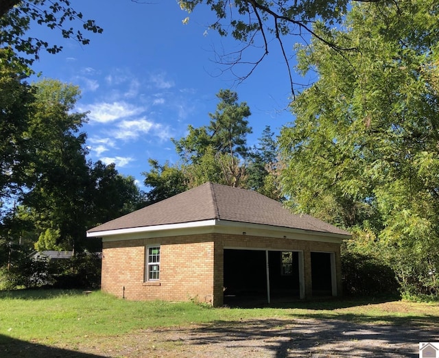 view of home's exterior with a yard