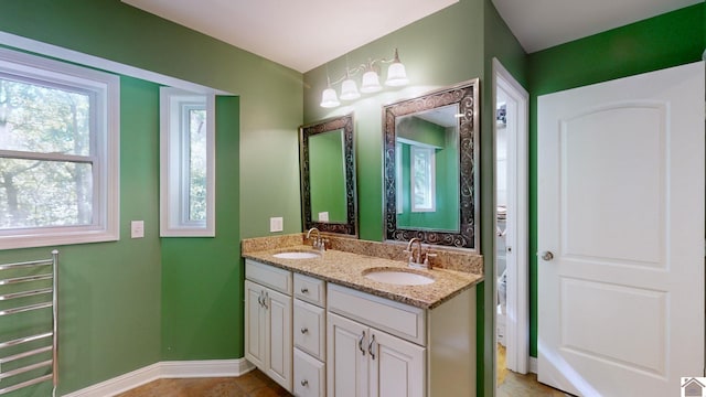 bathroom with tile patterned floors, toilet, and vanity