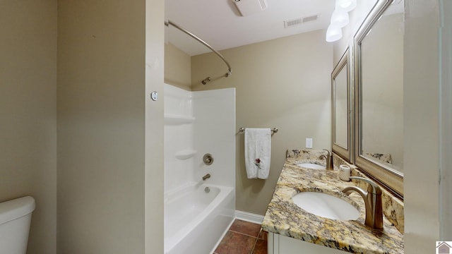 full bathroom featuring  shower combination, tile patterned floors, vanity, and toilet