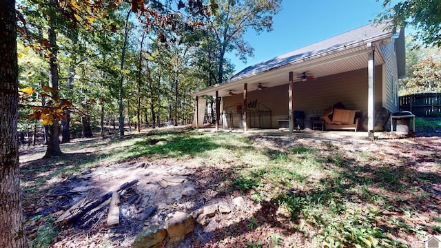 view of yard featuring ceiling fan