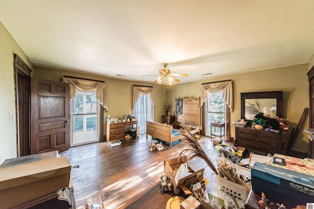 interior space featuring ceiling fan and hardwood / wood-style flooring