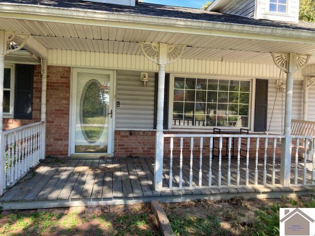 entrance to property with a porch