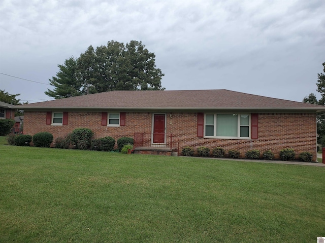 ranch-style home with a front yard