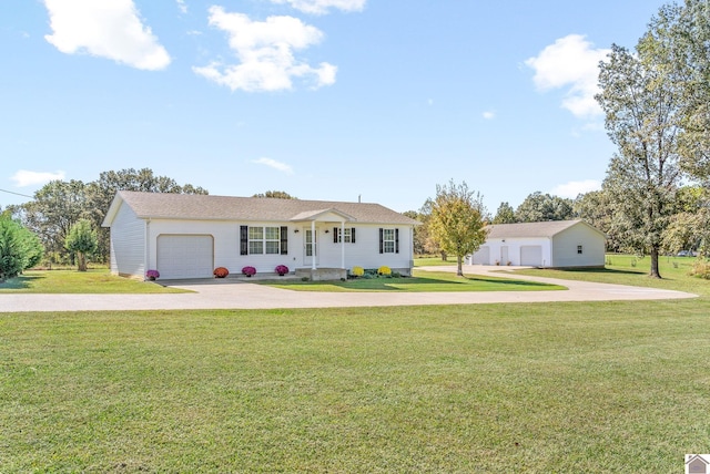 ranch-style house featuring a garage and a front lawn