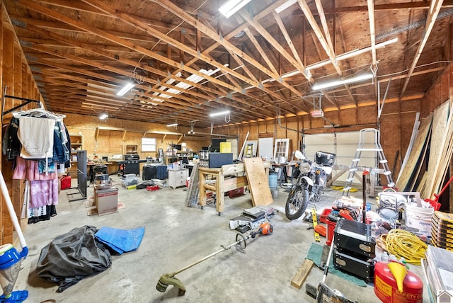 garage featuring a workshop area