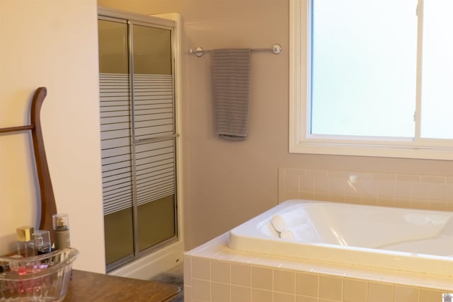 bathroom with independent shower and bath