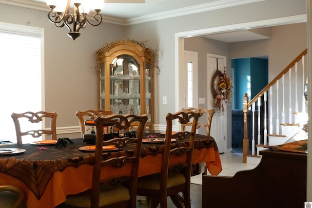 dining room featuring an inviting chandelier and crown molding