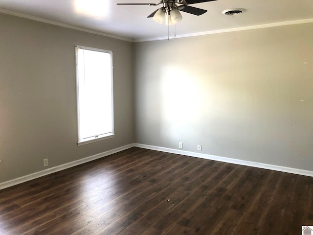 empty room with dark wood-type flooring, ceiling fan, and ornamental molding