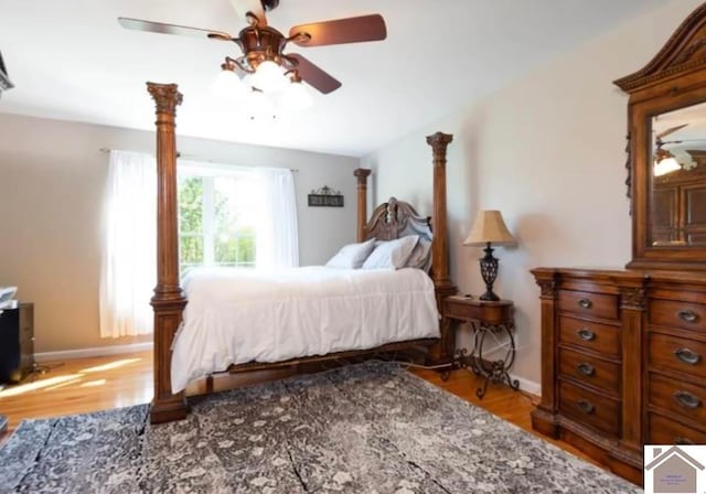 bedroom featuring light hardwood / wood-style flooring and ceiling fan