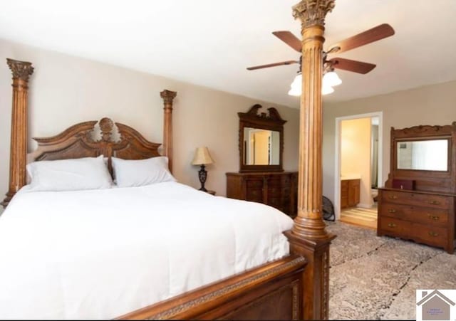 bedroom with ensuite bathroom and ceiling fan