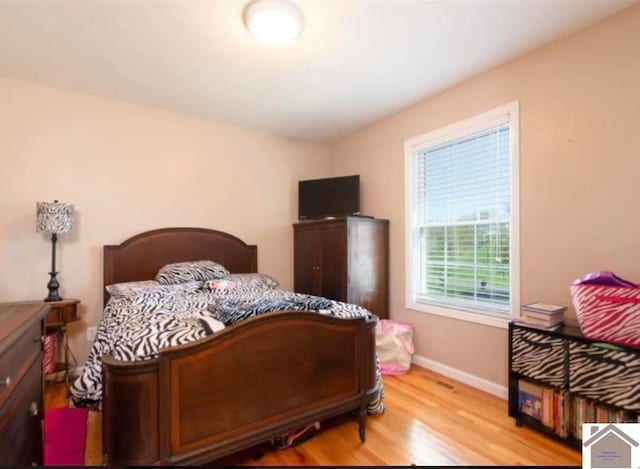 bedroom featuring light hardwood / wood-style flooring