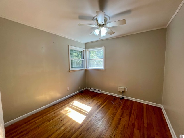 empty room featuring wood-type flooring, crown molding, and ceiling fan