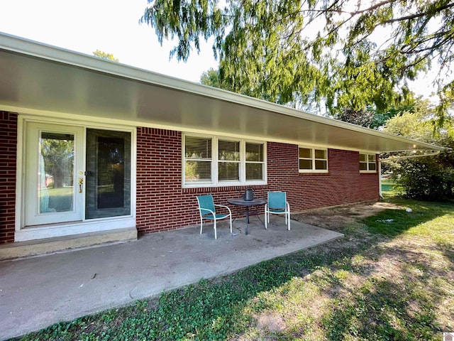 rear view of property with a patio