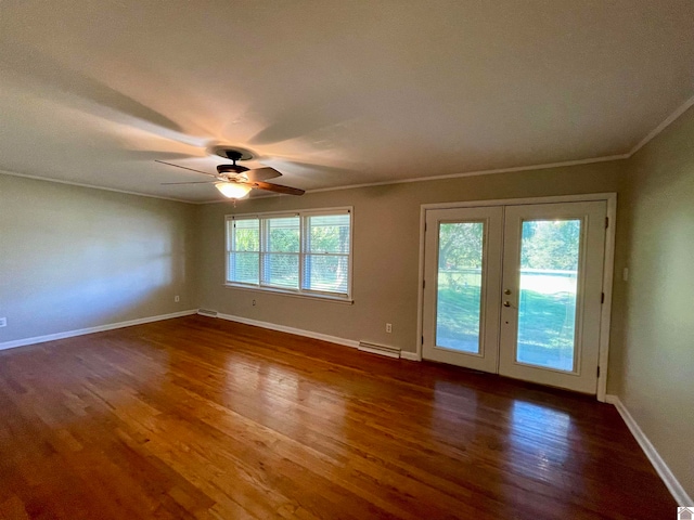 unfurnished room featuring crown molding, ceiling fan, dark wood-type flooring, and french doors