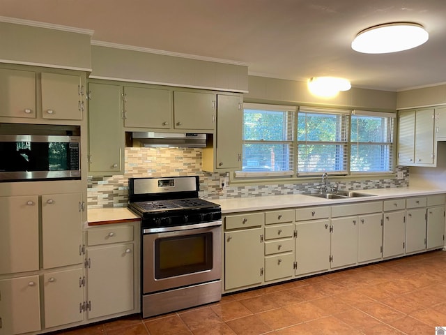 kitchen with exhaust hood, stainless steel appliances, tasteful backsplash, sink, and ornamental molding