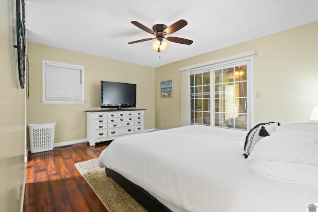 bedroom featuring dark wood-type flooring and ceiling fan