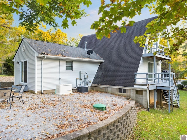 1405 Goose Holw, Cadiz, KY 42211 - rear view of house with a balcony, stairs, a shingled roof, a deck, and central AC unit