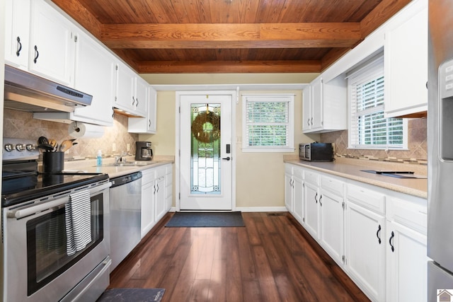 1405 Goose Holw, Cadiz, KY 42211 - kitchen with appliances with stainless steel finishes, under cabinet range hood, wood ceiling with exposed beams, light countertops, and dark wood-style floors