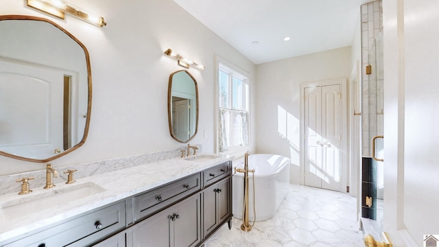 bathroom featuring vanity, tile patterned floors, and separate shower and tub