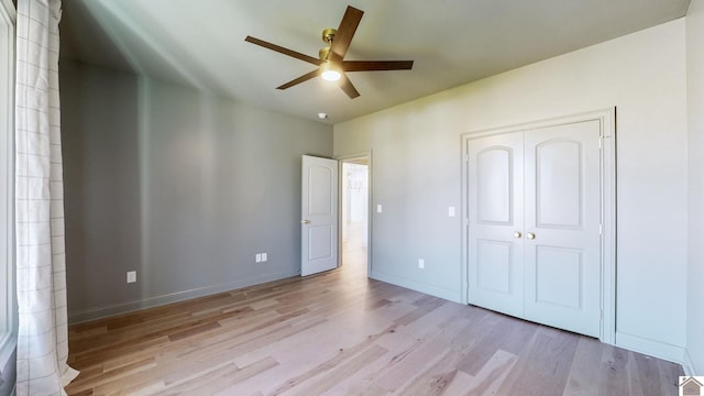 unfurnished bedroom with a closet, ceiling fan, and light hardwood / wood-style flooring