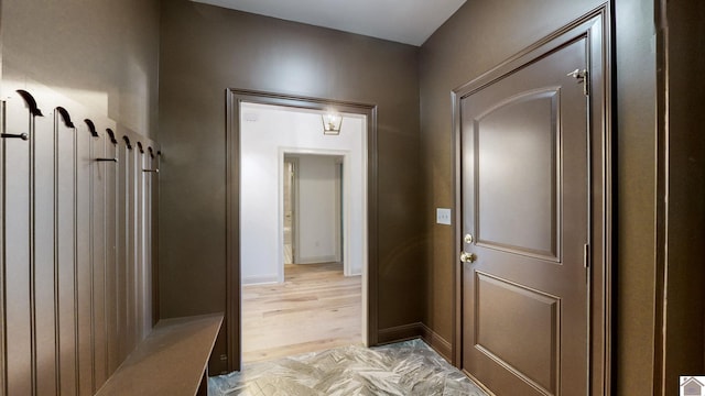 mudroom with light wood-type flooring