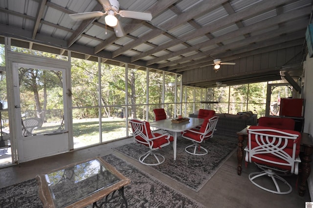 sunroom with vaulted ceiling and ceiling fan