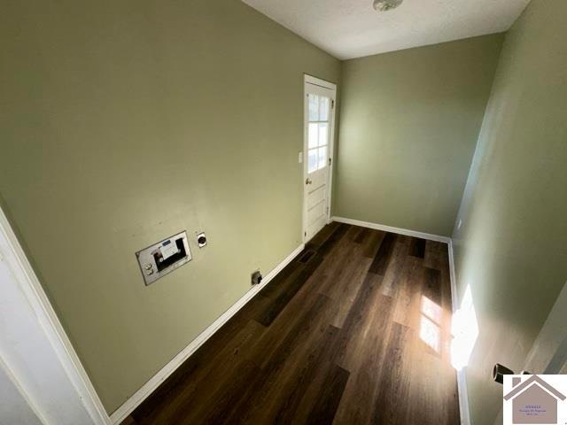 washroom with dark wood-type flooring, hookup for an electric dryer, and hookup for a washing machine