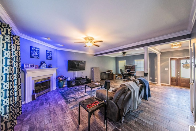 living room featuring ornamental molding, decorative columns, hardwood / wood-style floors, and ceiling fan