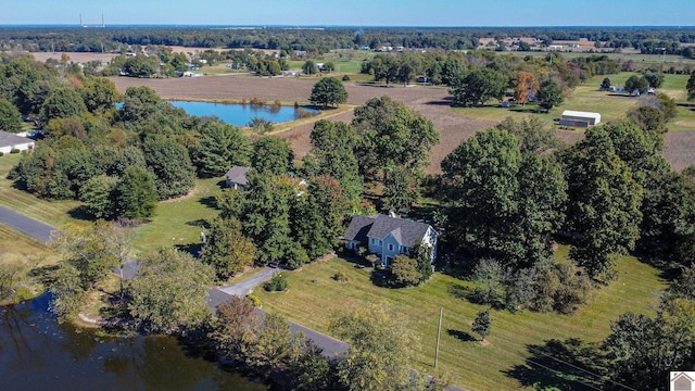 aerial view with a rural view and a water view