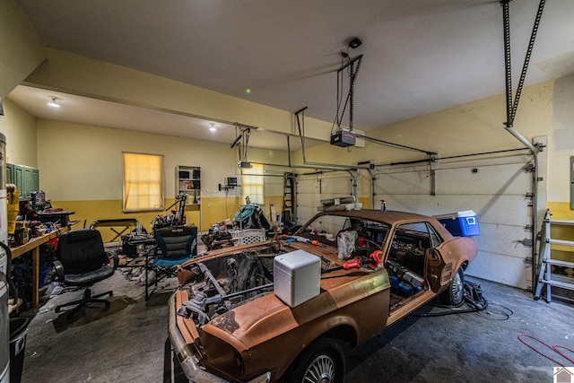 garage featuring a garage door opener