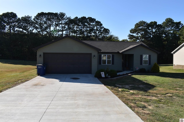 ranch-style home with a front lawn and a garage