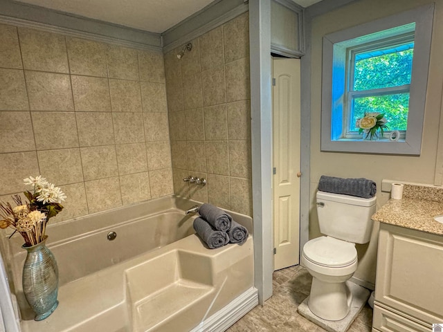 bathroom featuring a bath, toilet, ornamental molding, and vanity