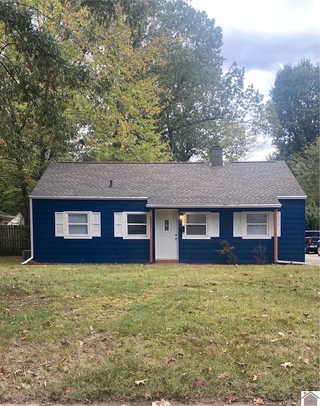 ranch-style house with a front lawn