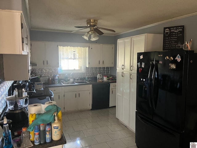 kitchen with ornamental molding, sink, black appliances, white cabinetry, and ceiling fan