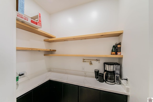 kitchen with light stone countertops