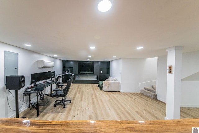 office with an AC wall unit, wood-type flooring, and electric panel